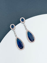 THEODORA - Sapphire Blue Long Dangle Teardrop CZ Crystal Earrings In Silver - JohnnyB Jewelry