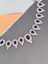 LILIANA - 15.5" Stunning Sapphire Blue Pear-Shaped CZ Choker Necklace With Matching Drop Earrings In Silver - JohnnyB Jewelry