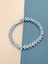 JOURNEY - 6.5" Repeat-Pattern Round CZ Bracelet In Silver