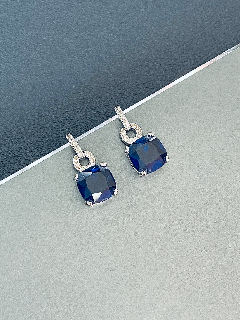 ELODIE - Dangle Sapphire Blue Cushion Earrings In Silver - JohnnyB Jewelry