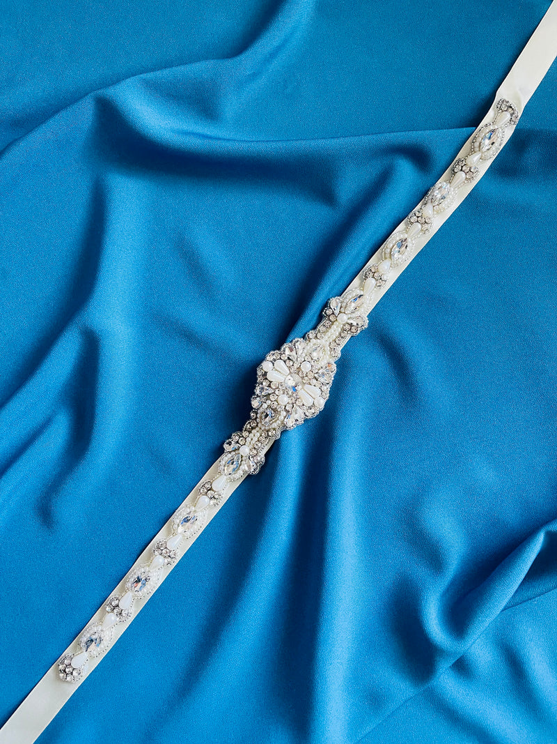 NICOLA - Slim, Refined Crystal And Pearl Belt Sash With Ornate Centre In Silver