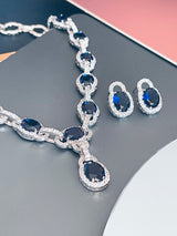 MICHELLE - 17" Oval Sapphire Blue CZ Stone With Matching Stud Earrings In Silver - JohnnyB Jewelry