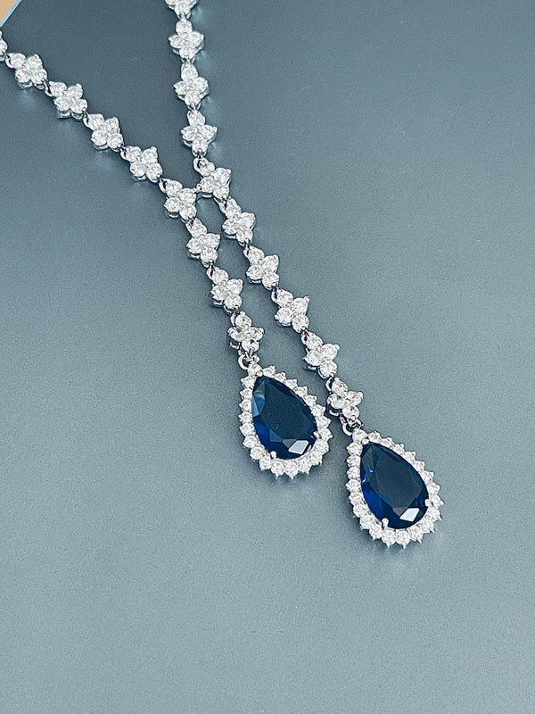 ORIANA - 17" Sapphire Blue Lariat-Look Necklace With Two Teardrop CZ Stones With Matching Drop Earrings In Silver - JohnnyB Jewelry