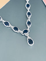 MICHELLE - 17" Oval Sapphire Blue CZ Stone With Matching Stud Earrings In Silver - JohnnyB Jewelry