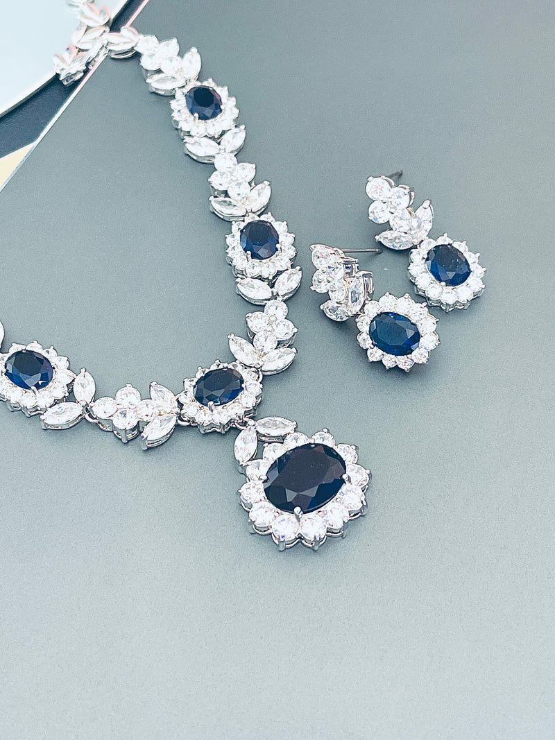 SUZANNA - 16.5" Sapphire Blue Oval CZ Necklace With Matching Dangle Drop Earrings In Silver - JohnnyB Jewelry