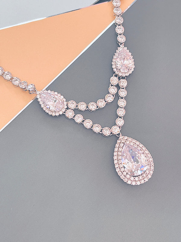 ANTOINETTE - 16" Clear CZ Teardrop Dangle Necklace With Matching Drop Earrings In Silver - JohnnyB Jewelry