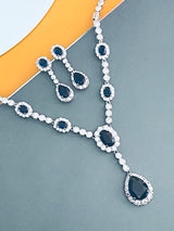 GISELLE - 16.5" Sapphire Blue Oval CZ Necklace With Teardrop Pendant And Matching Earrings In Silver - JohnnyB Jewelry