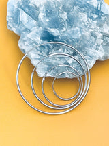 HOLLY - Sterling Silver Plain Thin Continuous Hoop Earrings In Silver
