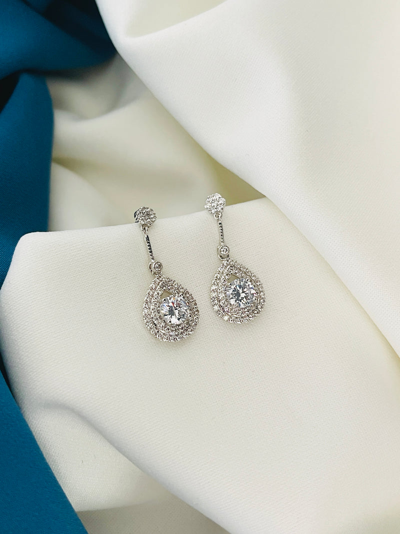 ADRIANNA - Tiny CZ Pave Open Teardrop Earrings In Silver