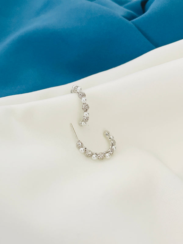 ARIA - CZ Pave Rotate With Pearl Huggie Earrings In Silver