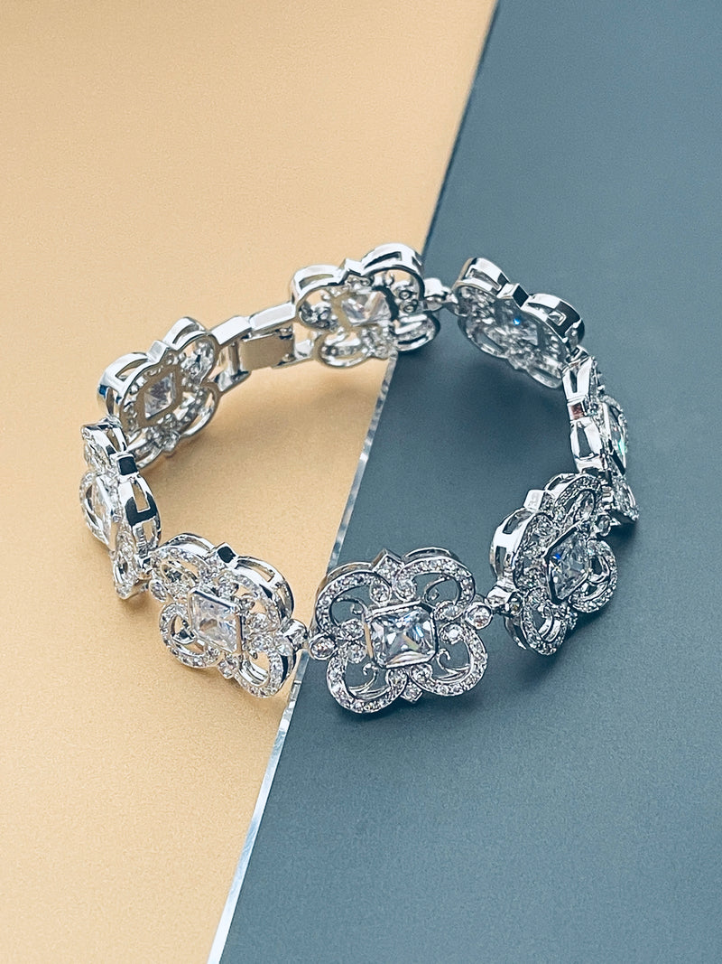 MERIDETH - 6.5" Multi-Shaped CZ  Flower Bracelet In Silver - JohnnyB Jewelry