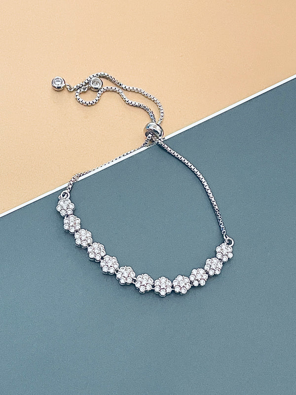 JASMINE - Links Of Flower-Shaped Round CZs Adjustable Bracelet In Silver - JohnnyB Jewelry