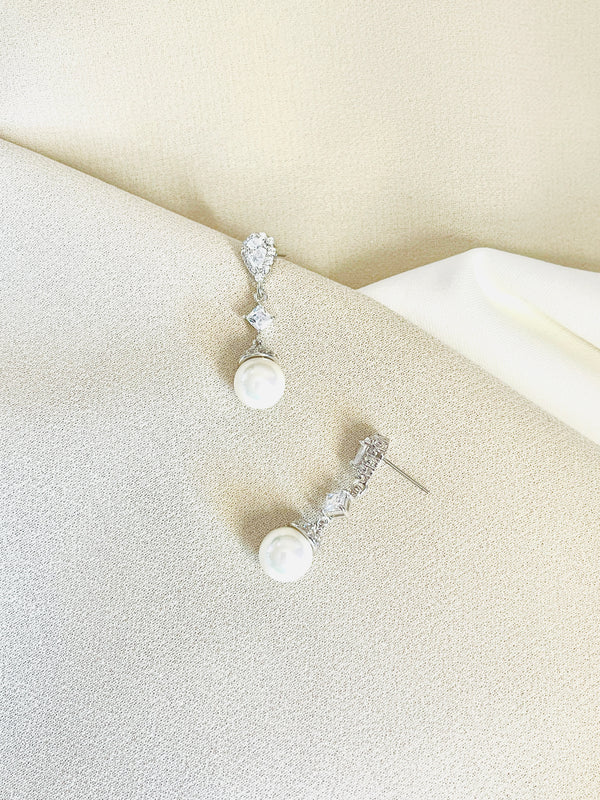 EMELIA - Delicate Drop Pearl Earrings In Silver - JohnnyB Jewelry