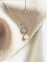 EVELYNE - Graceful CZ Medallion And Pearl Necklace In Silver