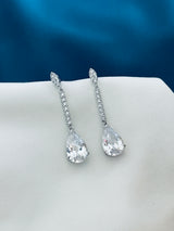 RAINE - Slender Drop Crystal Earrings In Silver - JohnnyB Jewelry